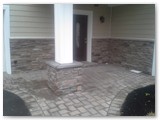Paver Entrance with Stone Facing on Home
