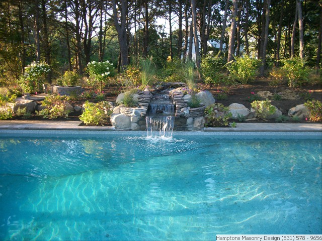 Poolside Waterfall and Patio 1 of 4