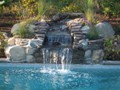 Poolside Waterfall and Patio 2 of 4