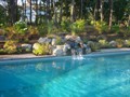 Poolside Waterfall and Patio 4 of 4