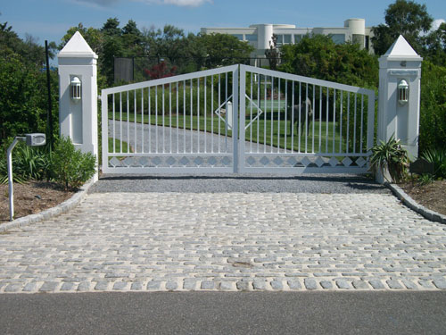 hamptons entrance gate company gravel driveway cobblestone aprons